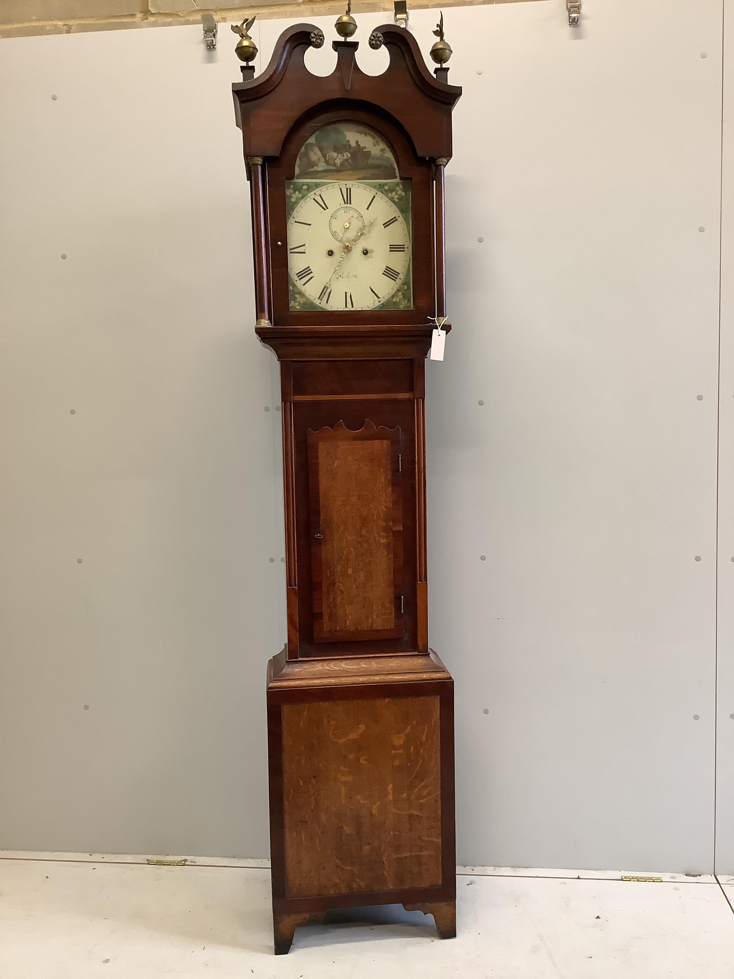 An early 19th century oak and mahogany eight day longcase clock, the painted dial marked Sleaford, height 222cm